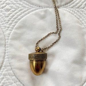 {Larissa Loden} Gold acorn container pendant